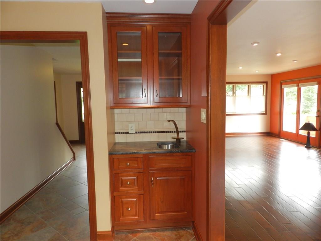 2533 Riva Ridge Court Franklin Park, PA 15090 - Photo 15 of 25 The breakfast room also features its own wet bar, for ease in entertaining.