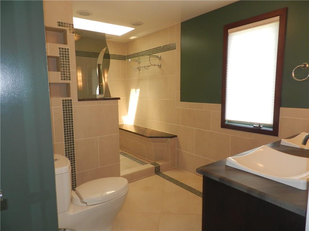 2533 Riva Ridge Court Franklin Park, PA 15090 - Photo 19 of 25 This master bath features custom tile and granite through out! The shower is a work of art, and would be best place to start or finish a busy day!