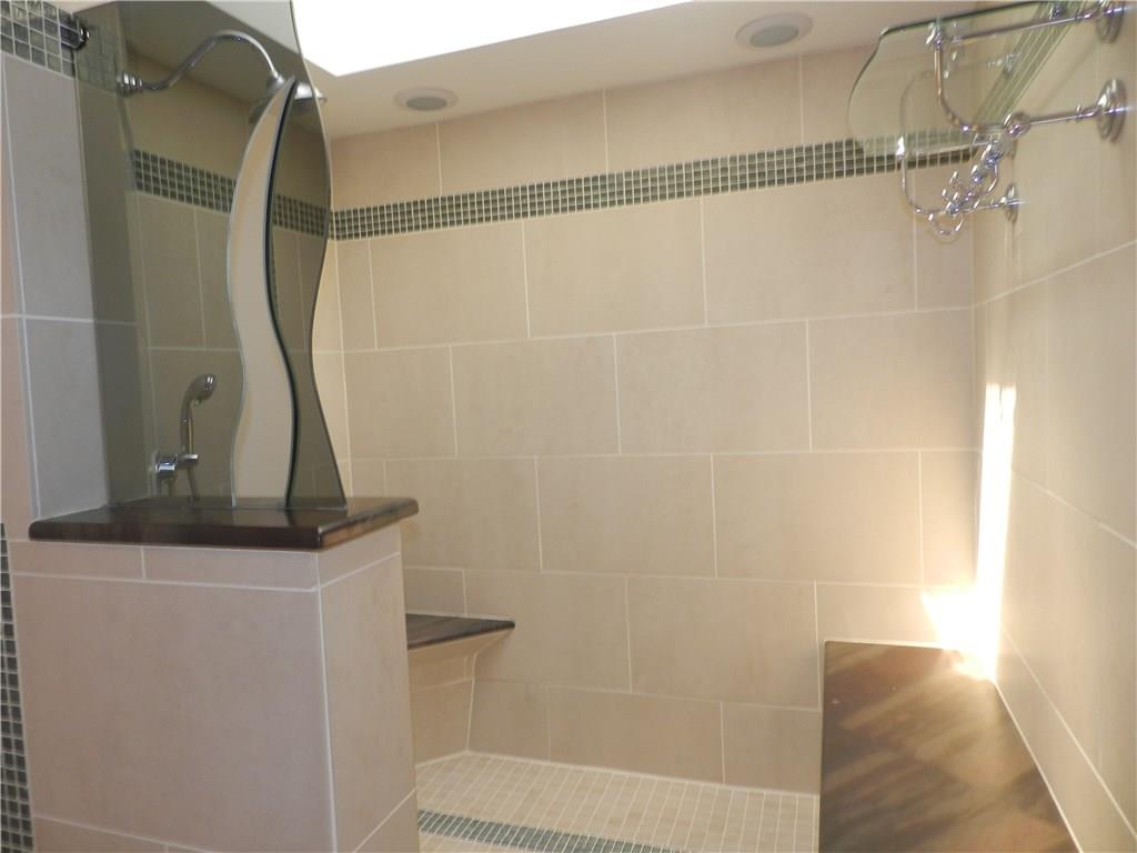 2533 Riva Ridge Court Franklin Park, PA 15090 - Photo 20 of 25 Natural light shines into the shower area. This home has wonderful natural light through-out.
