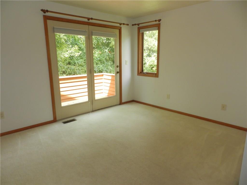 2533 Riva Ridge Court Franklin Park, PA 15090 - Photo 23 of 25 This bedroom is large, neutral and features its own private balcony, which overlooks the beautiful landscaping.