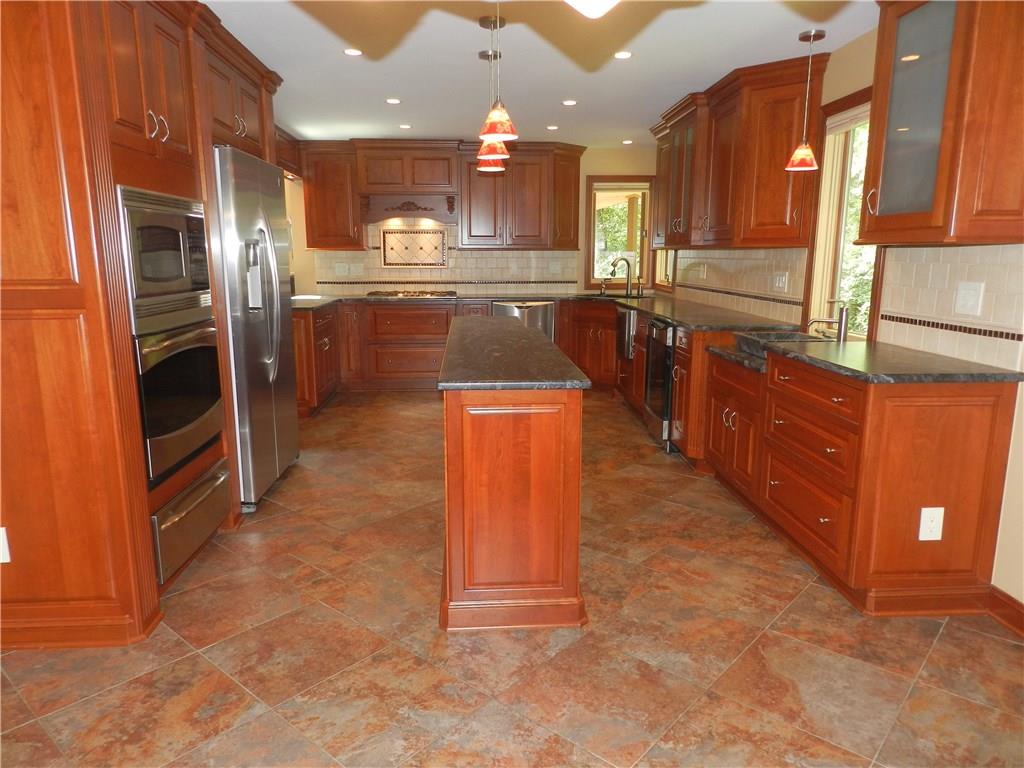 2533 Riva Ridge Court Franklin Park, PA 15090 - Photo 10 of 25 This custom, state of the art, kitchen has it all! Two sinks, two dishwashers, gas cook top, and an island for maximum prep space. Gorgeous!