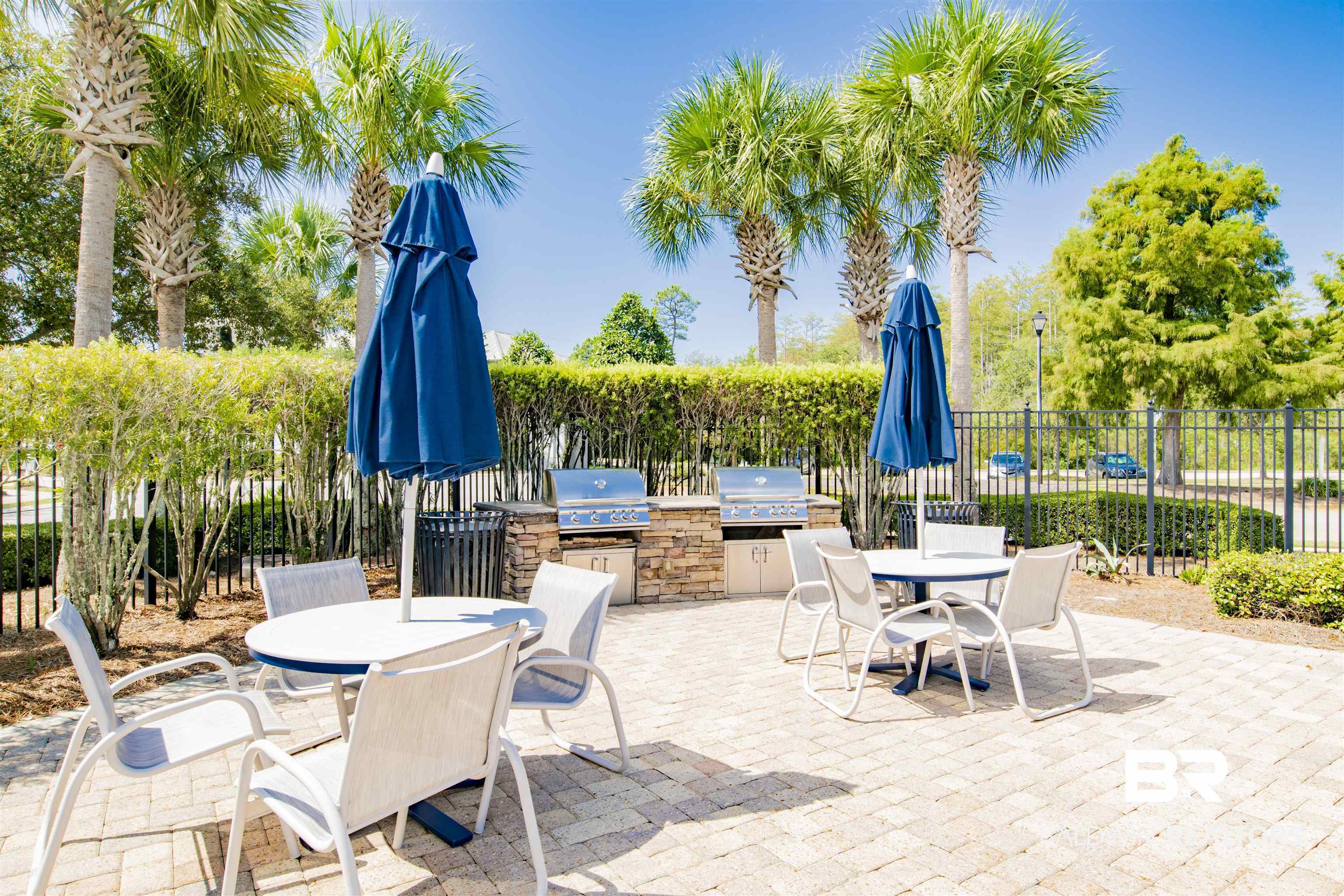 23893 Cypress Crossing Orange Beach, AL 36561 - Photo 20 of 22 View of patio with outdoor dining area and an outdoor kitchen