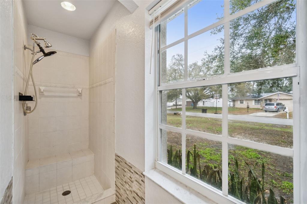 2255 Ancho Avenue Spring Hill, FL 34608 - Photo 11 of 24 a view of a glass door with a glass door