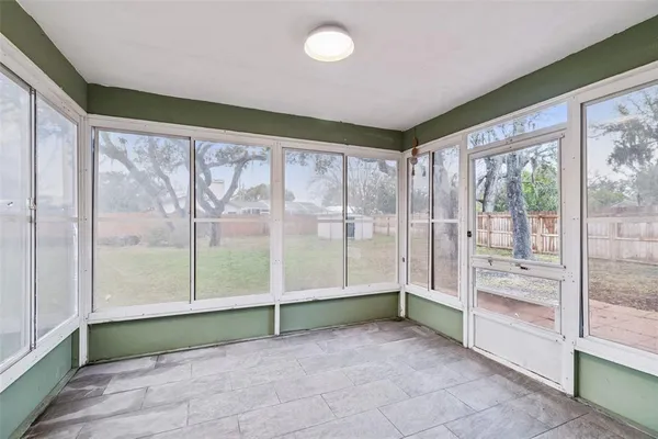 a view of an empty room and window
