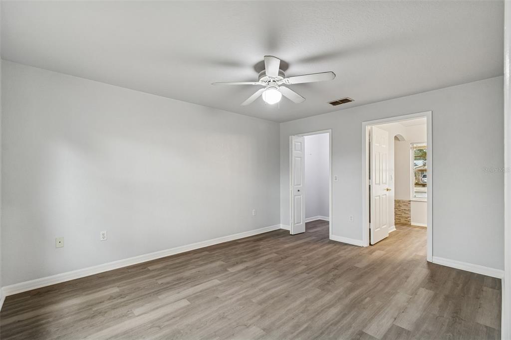 2255 Ancho Avenue Spring Hill, FL 34608 - Photo 8 of 24 wooden floor in an empty room