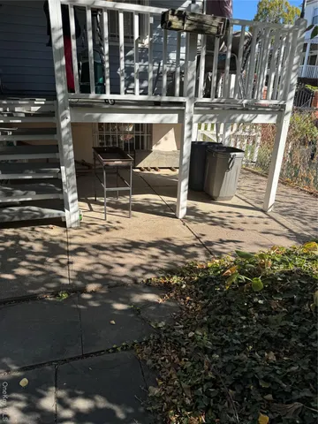 a view of a backyard of the house