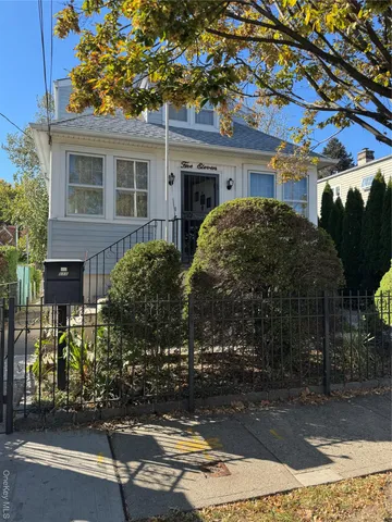 a view of a house with a street
