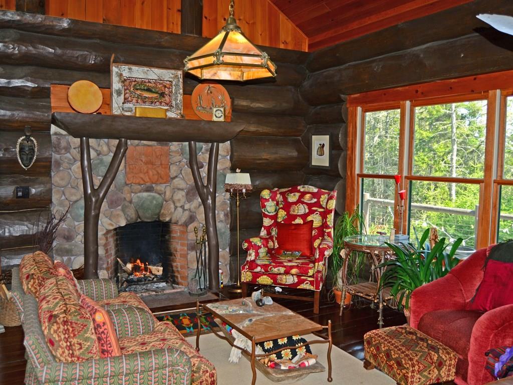 78 Ferry Road Hancock, ME 04640 - Photo 6 of 30 Open concept Living Room fireplace.