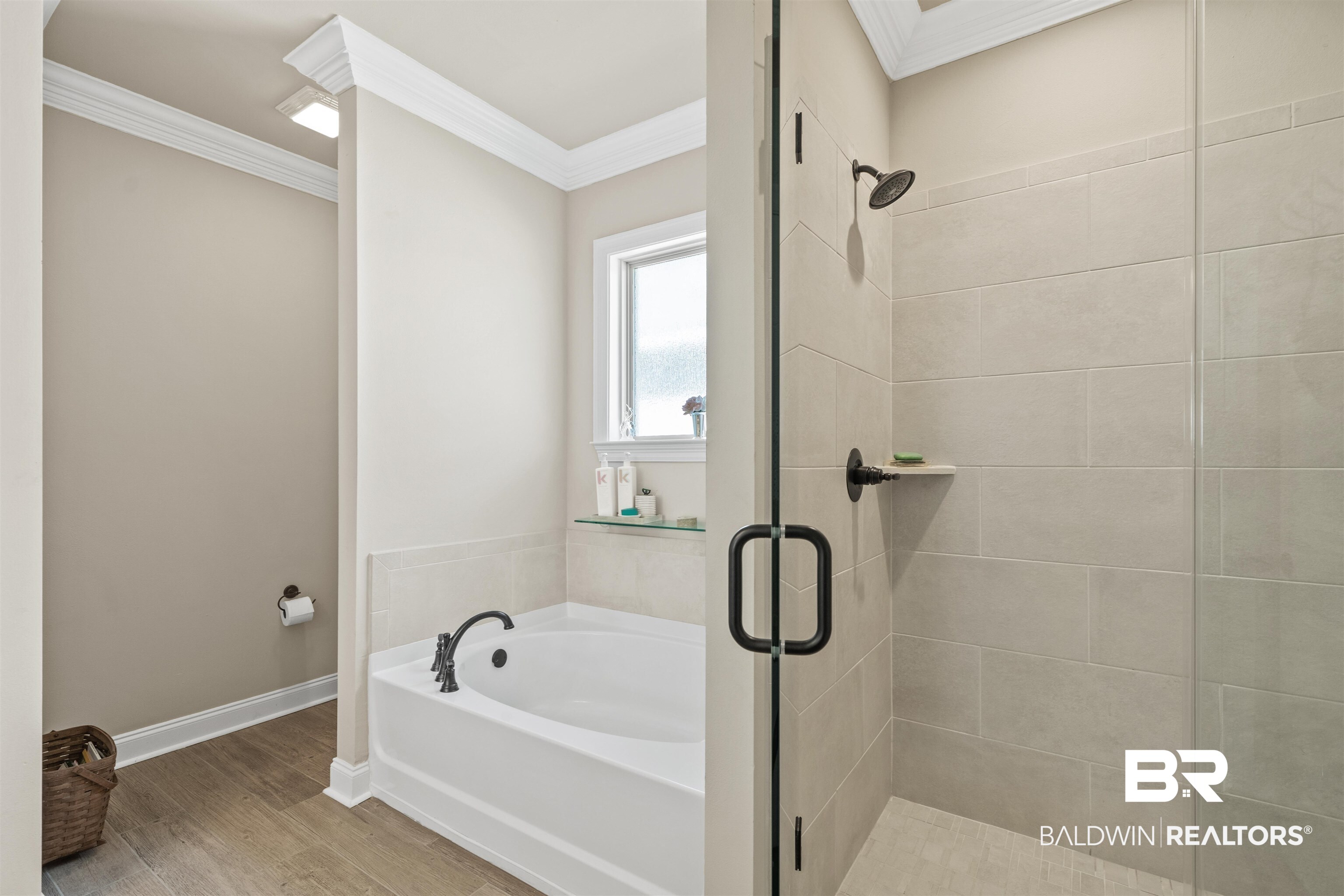 1509 Fenton Circle Foley, AL 36535 - Photo 24 of 34 Full bathroom with a shower stall, a bath, wood finished floors, and ornamental molding