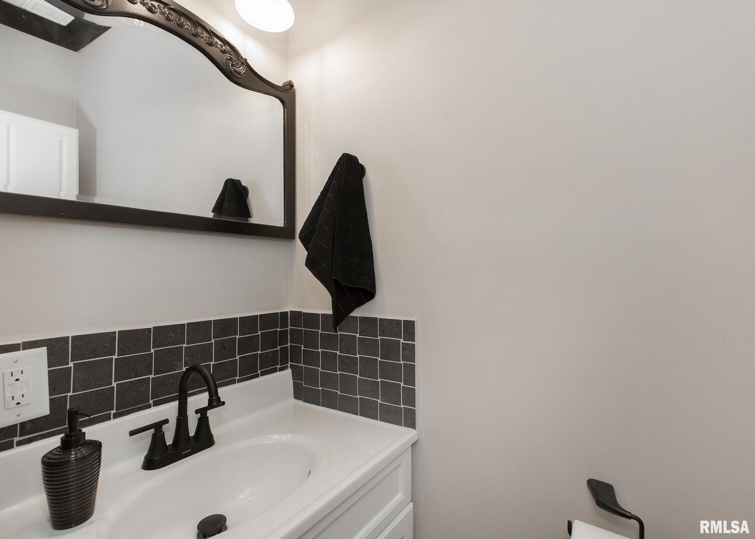 213 North Williams Street Geneseo, IL 61254 - Photo 21 of 42 a bathroom with a sink