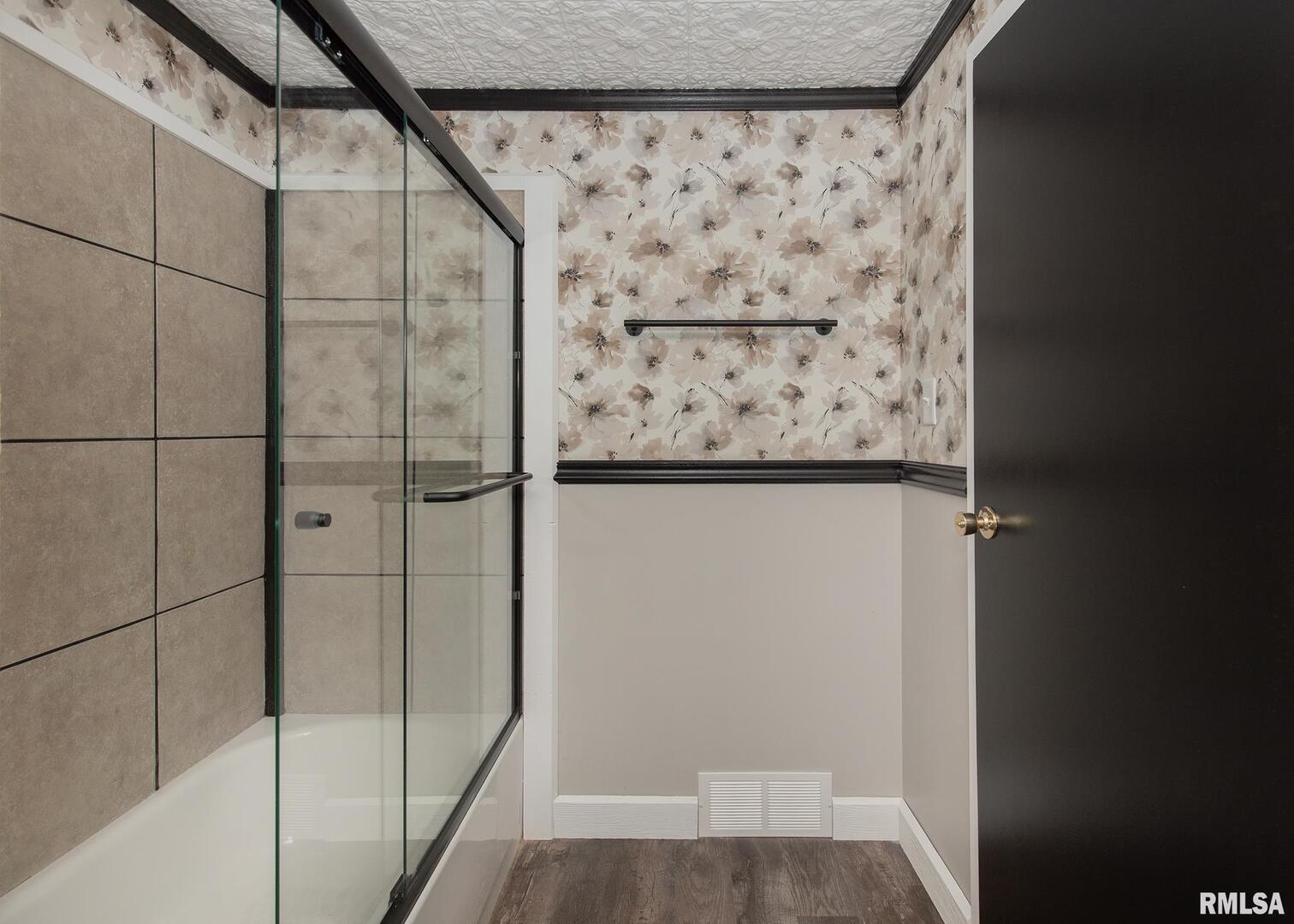 213 North Williams Street Geneseo, IL 61254 - Photo 30 of 42 a bathroom with a shower