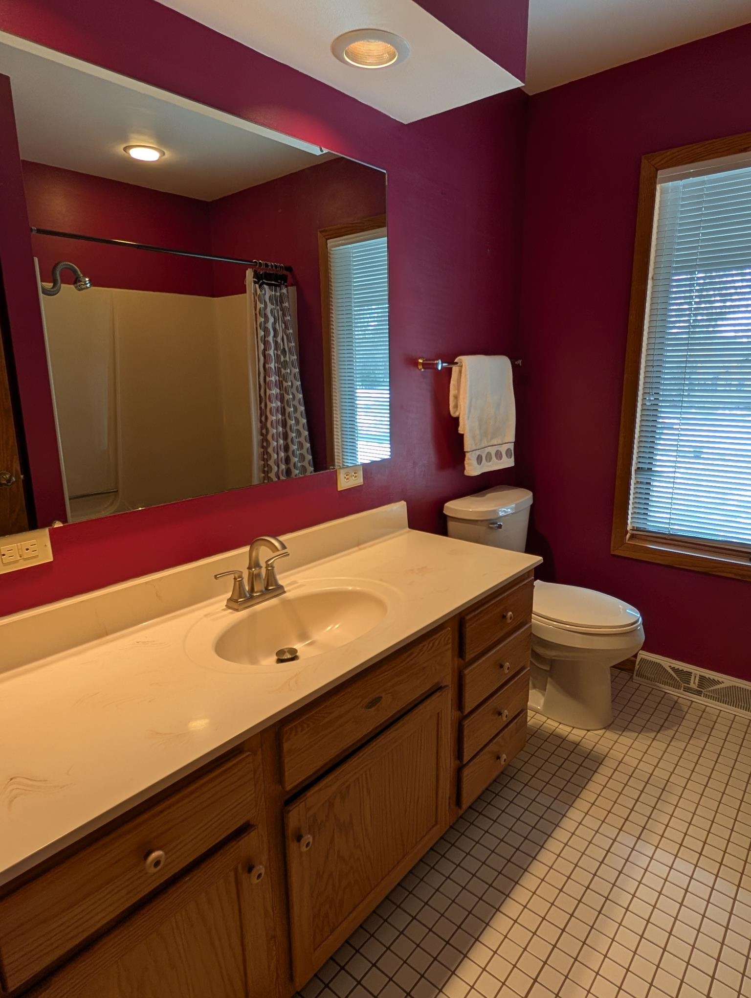 684 Sioux Drive Freeport, IL 61032 - Photo 16 of 44 a bathroom with a toilet sink and mirror
