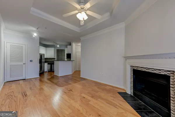a view of a kitchen with microwave and a stove