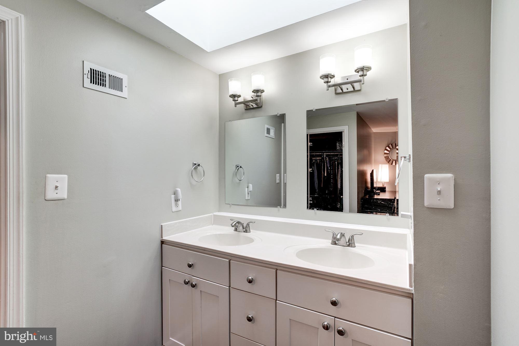 11192 Silentwood Lane Reston, VA 20191 - Photo 18 of 33 Skylight in Master Bathroom