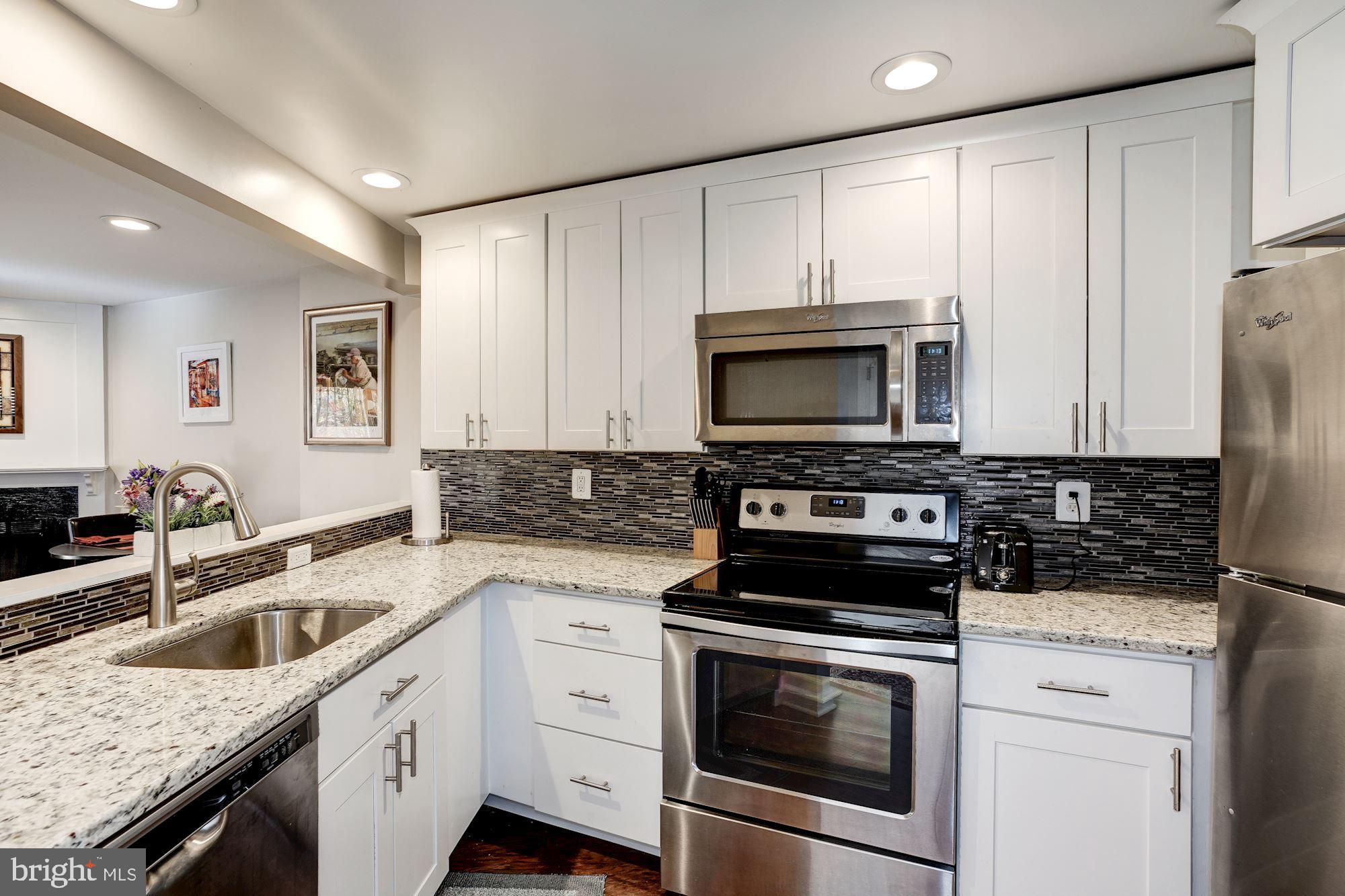 11192 Silentwood Lane Reston, VA 20191 - Photo 4 of 33 Updated Kitchen with Stainless Steel Appliances