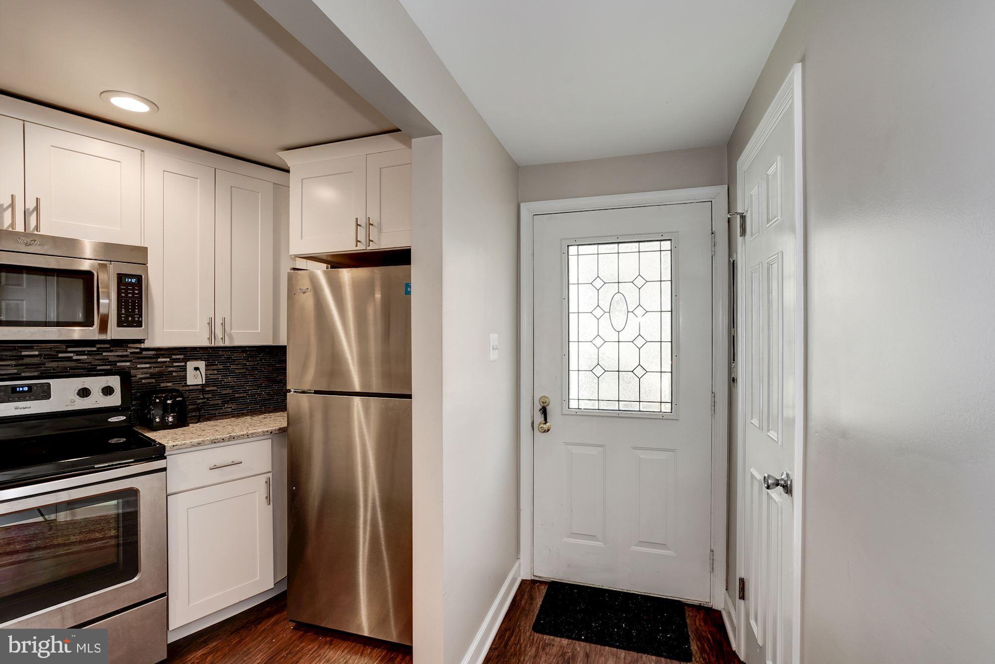 11192 Silentwood Lane Reston, VA 20191 - Photo 6 of 33 Light Filled Entry Way