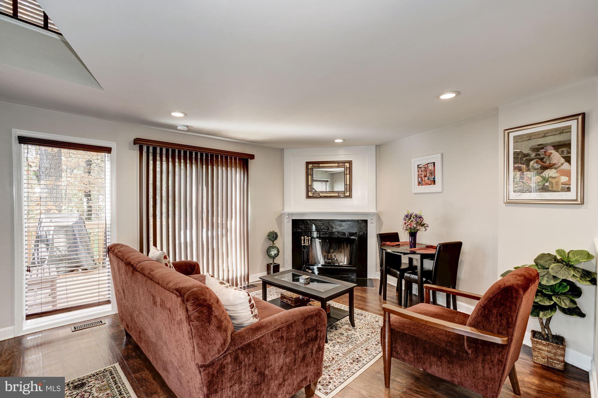 11192 Silentwood Lane Reston, VA 20191 - Photo 7 of 33 Great Room with Wood Burning Fireplace
