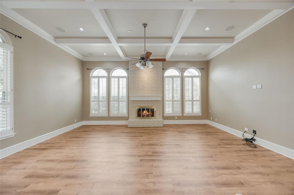 1201 Findlay Drive Arlington, TX 76012 - Photo 5 of 35 a view of an empty room with a fireplace and a window