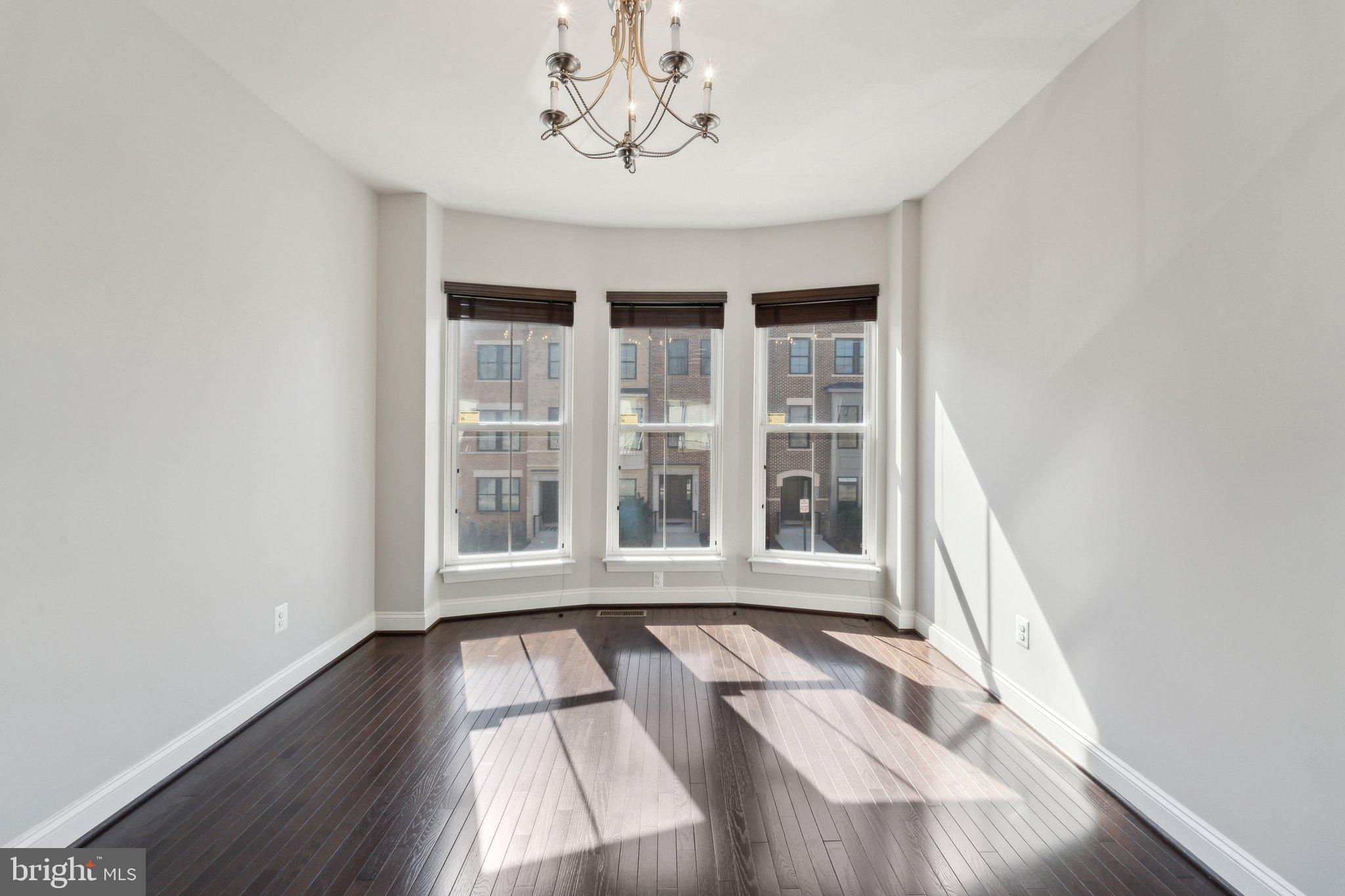 20398 Codman Drive Ashburn, VA 20147 - Photo 17 of 39 a view of an empty room with a window