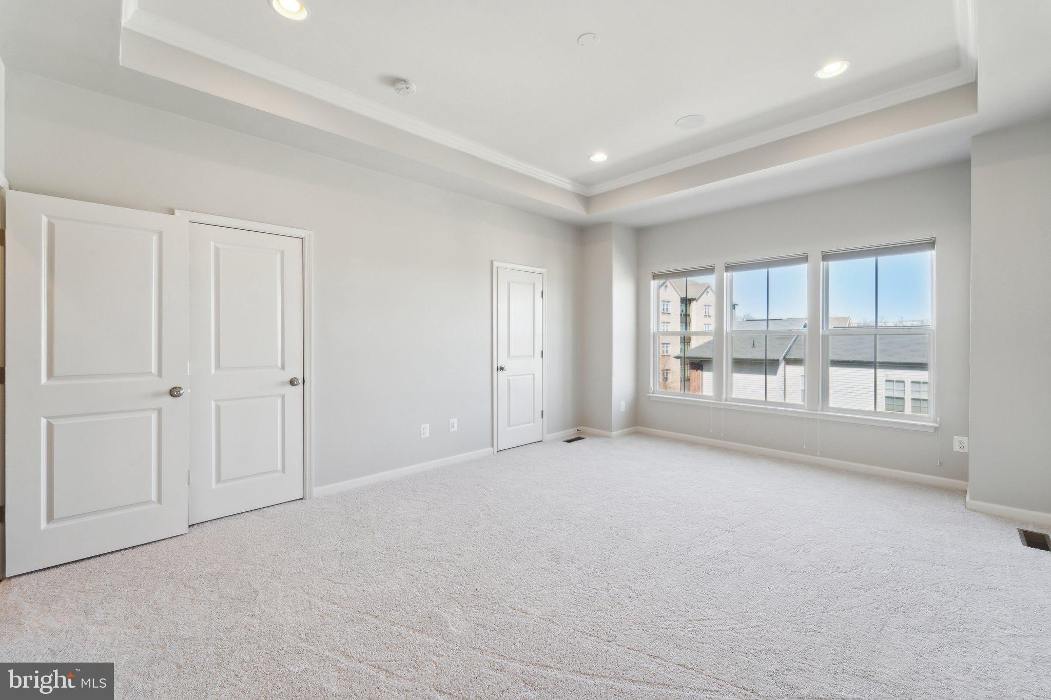 20398 Codman Drive Ashburn, VA 20147 - Photo 22 of 39 a view of an empty room with a window
