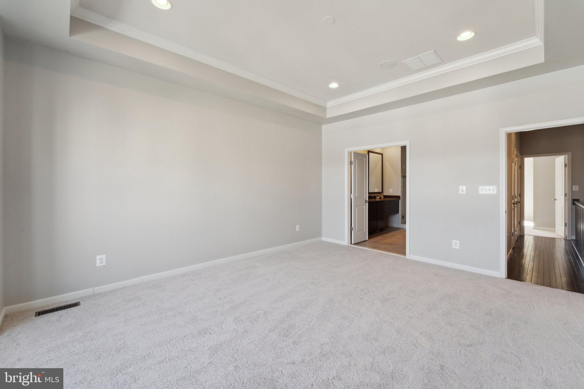 20398 Codman Drive Ashburn, VA 20147 - Photo 23 of 39 a view of an empty room with an entryway