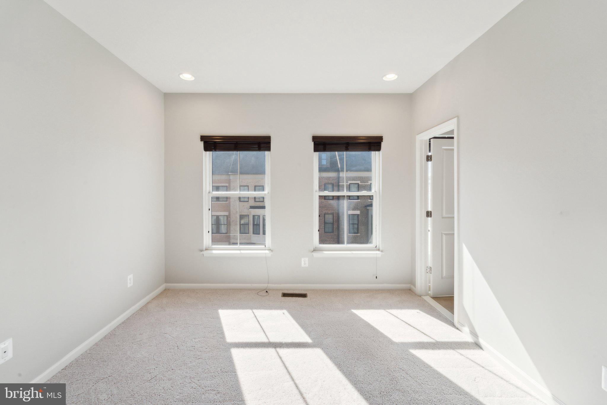 20398 Codman Drive Ashburn, VA 20147 - Photo 30 of 39 a view of an empty room with a window