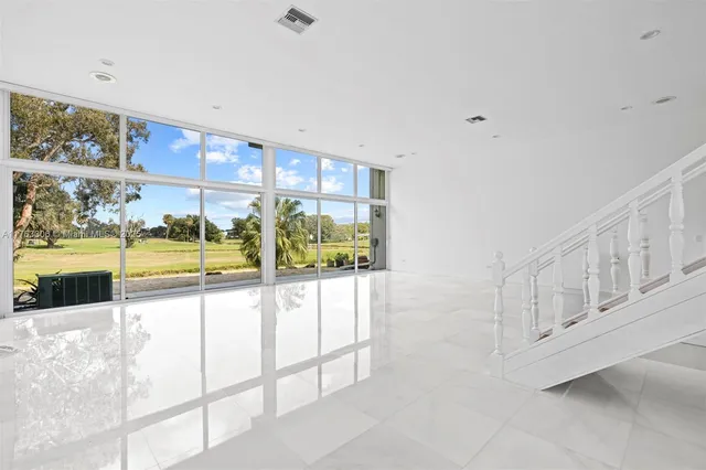 a room with table and chairs