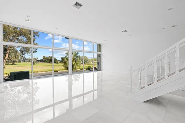 a room with table and chairs