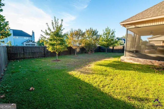 a view of a backyard with a garden