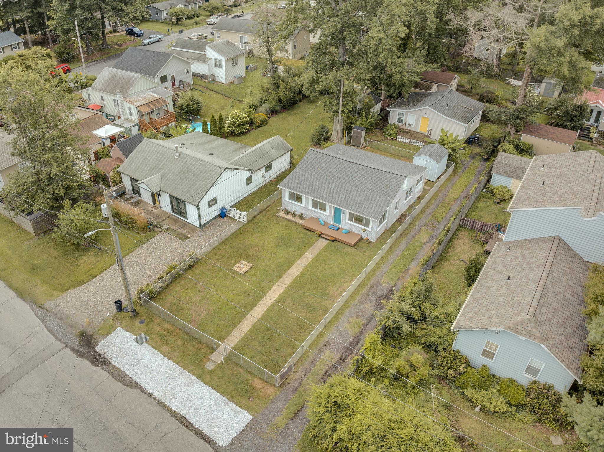 3911 3rd Street North Beach, MD 20714 - Photo 23 of 48 an aerial view of residential houses with outdoor space