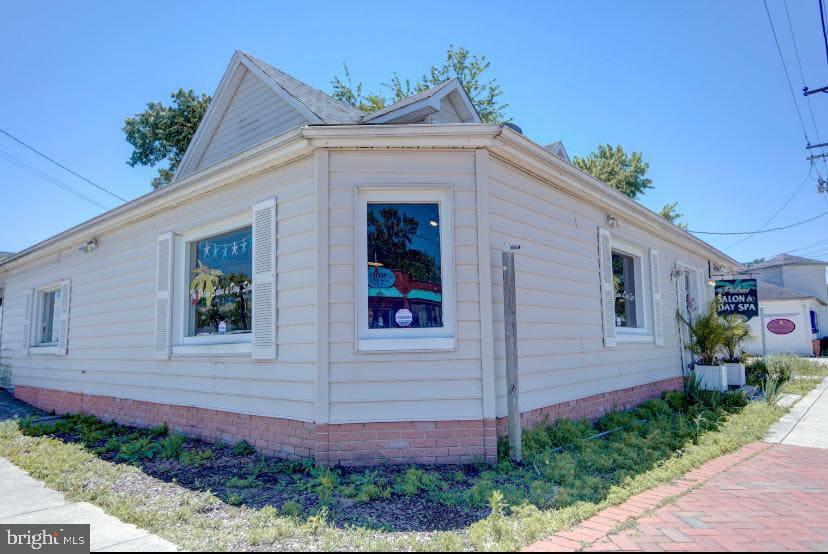 3911 3rd Street North Beach, MD 20714 - Photo 44 of 48 a view of a house with a small entryway