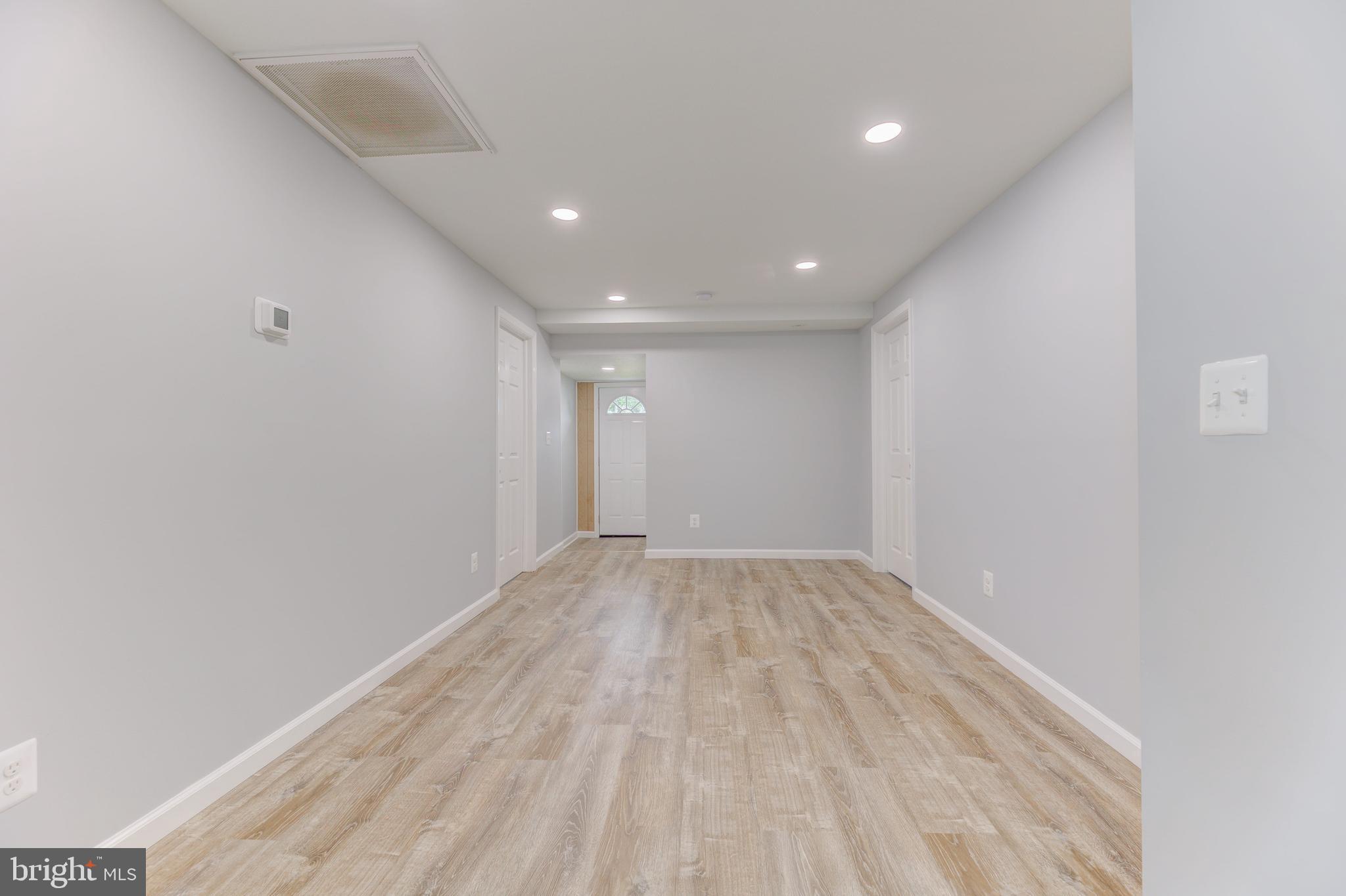 3911 3rd Street North Beach, MD 20714 - Photo 9 of 48 a view of an empty room