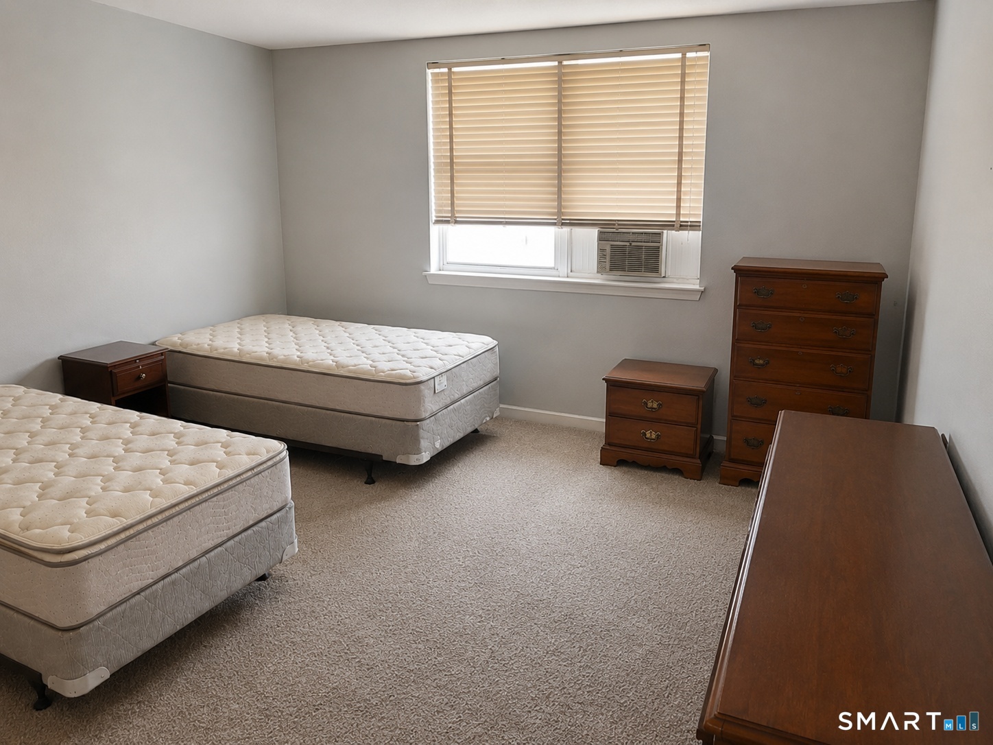 53 Wolcott Hill Road, Unit C12 Wethersfield, CT 06109 - Photo 16 of 25 a bedroom with bed and window
