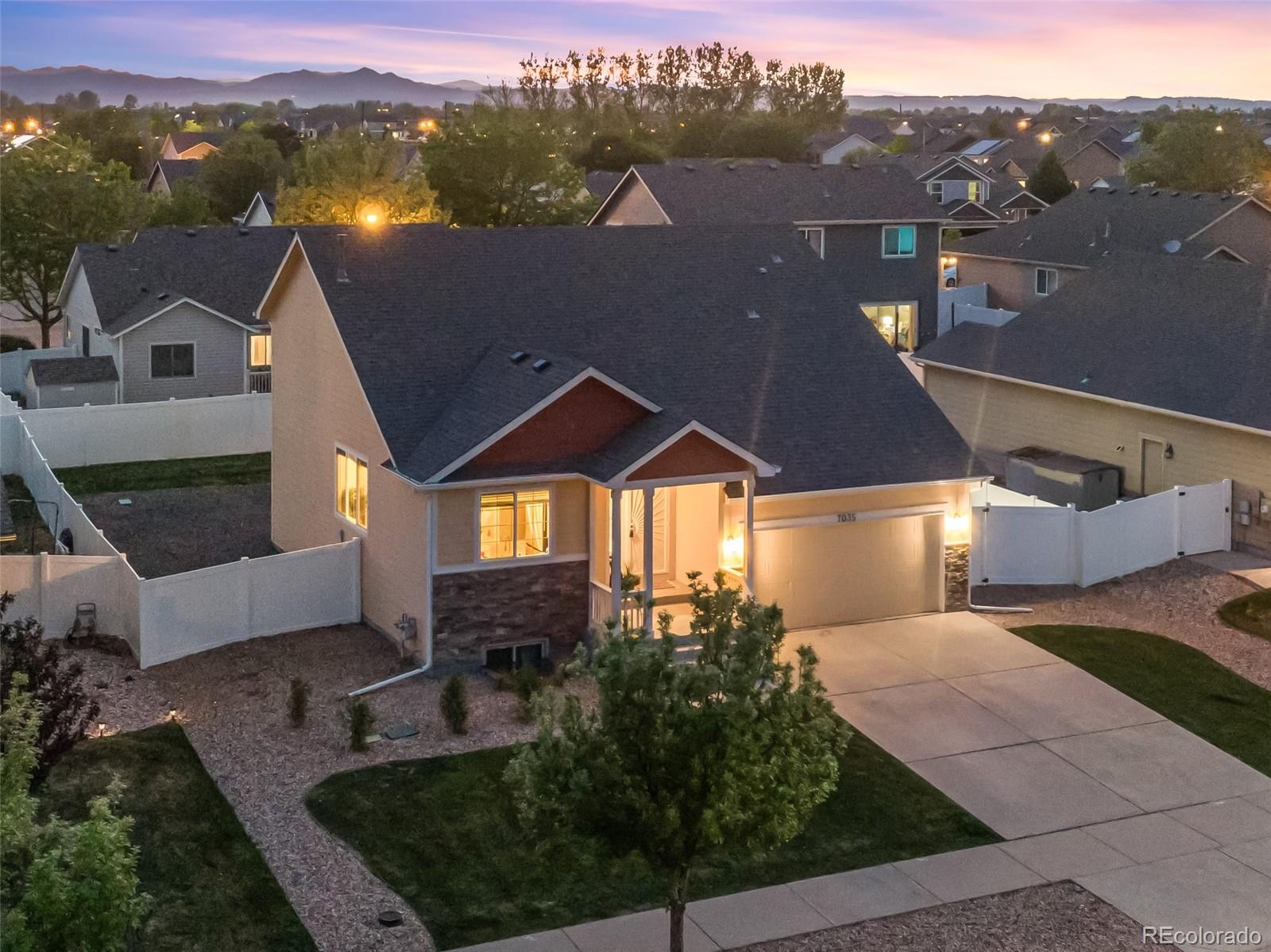 7035 McClellan Road Wellington, CO 80549 - Photo 42 of 43 an aerial view of a house with a yard