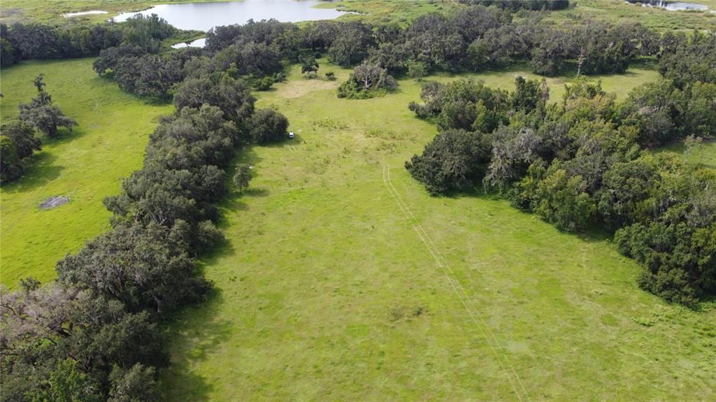 772 C Cr Webster, FL 33597 - Photo 5 of 19 a view of a lake with a houses