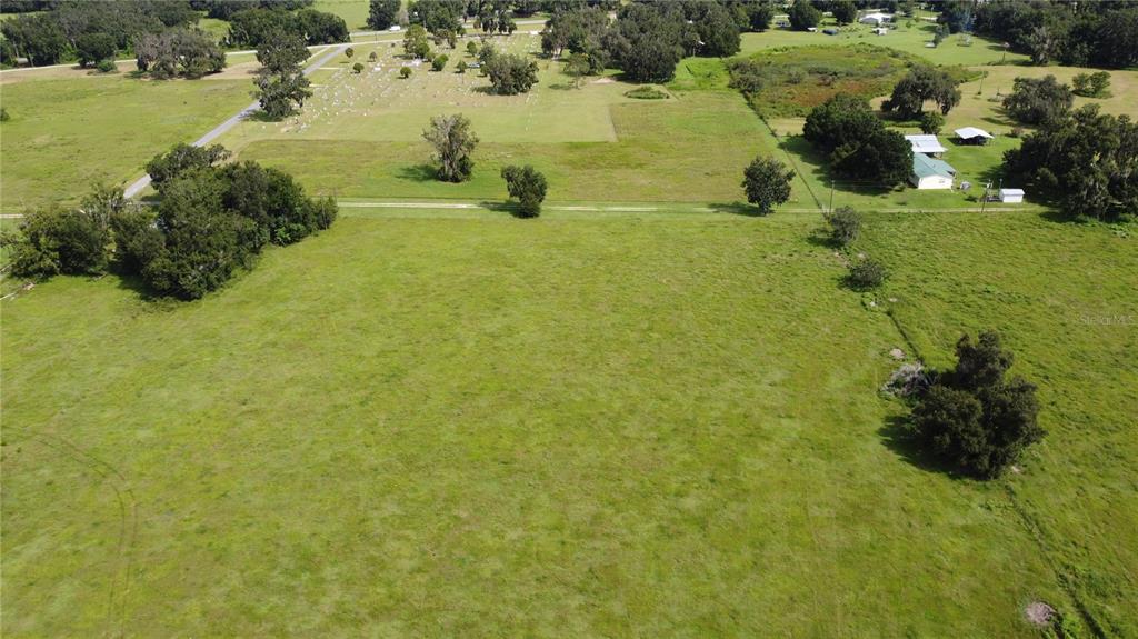 772 C Cr Webster, FL 33597 - Photo 10 of 19 a view of a lake with a yard