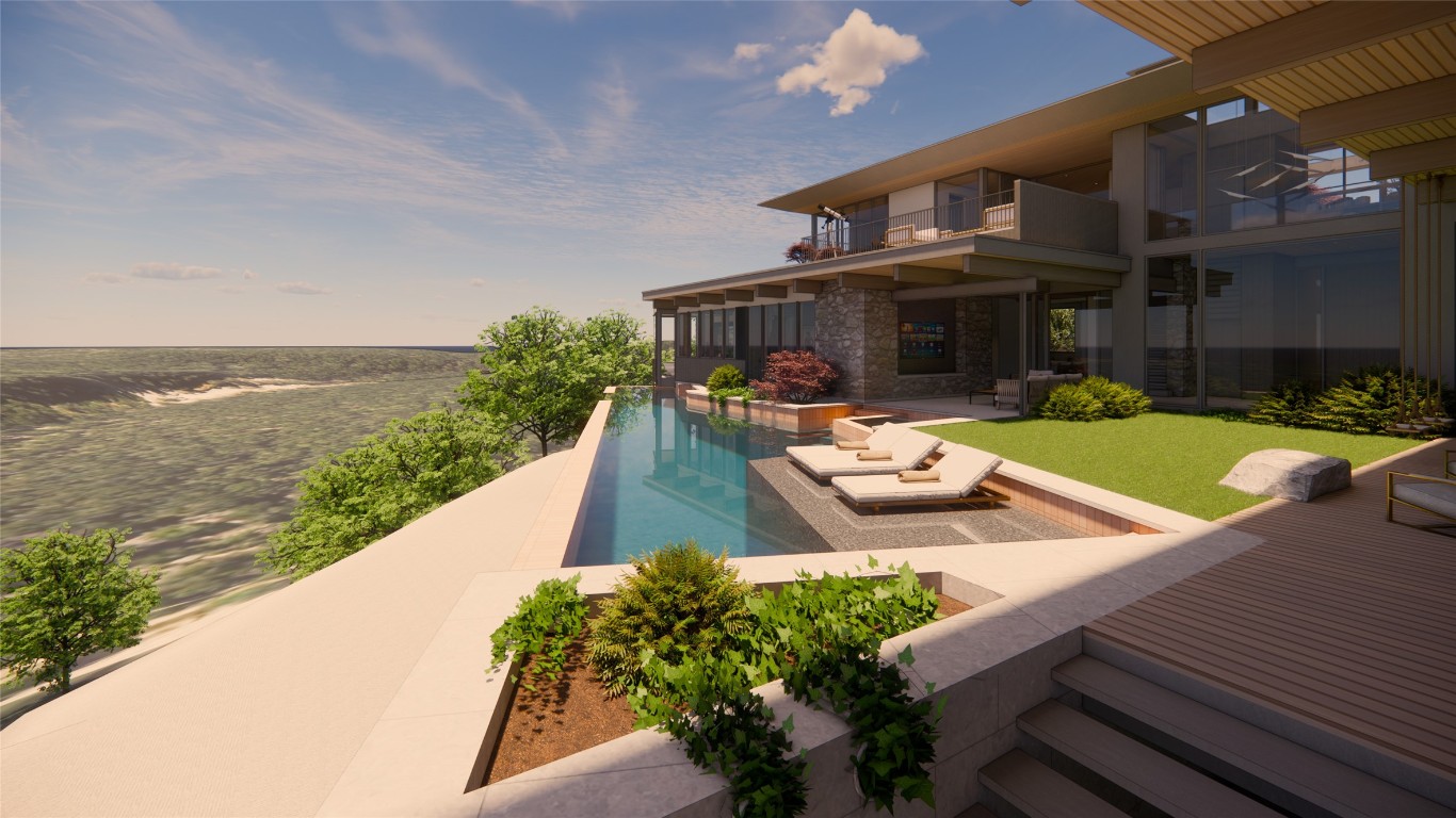 swimming pool view with a seating space