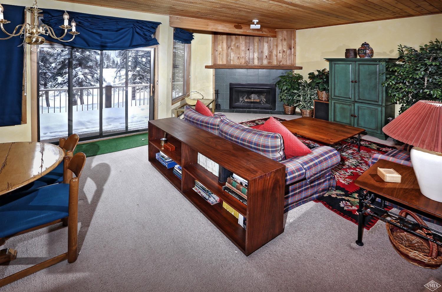 2335 Bald Mountain Road, Unit A5 Vail, CO 81657 - Photo 16 of 17 a bed sitting in a room next to a window