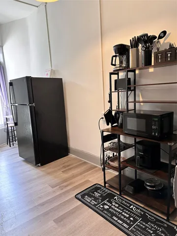 a view of a workspace with furniture