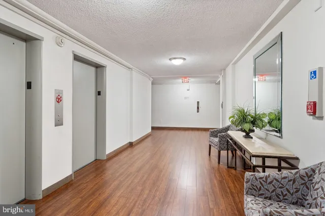 a room with furniture and wooden floor