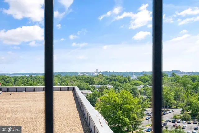 a view of a street from a balcony