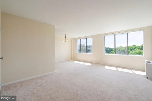 an empty room with windows