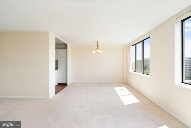 an empty room with windows