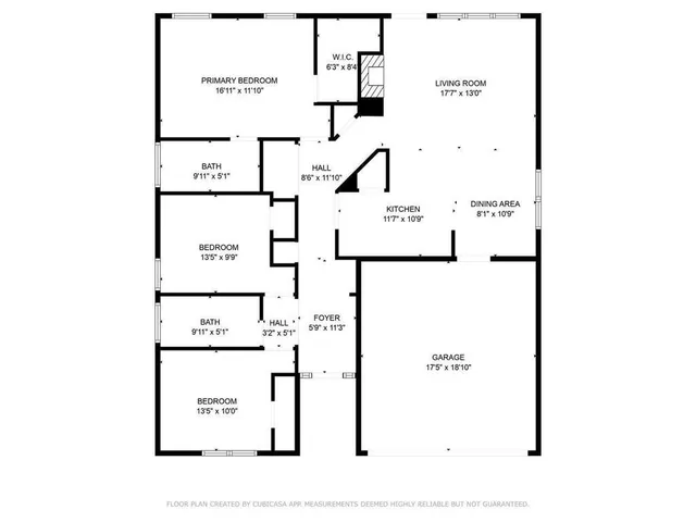 a picture of a bench in front of a wall