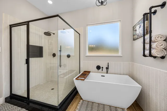 a bedroom with a bed and a desk