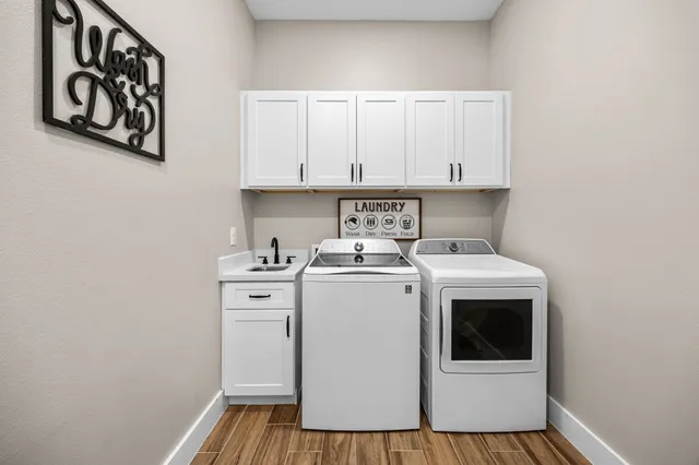 a picture of a bathroom with a shower