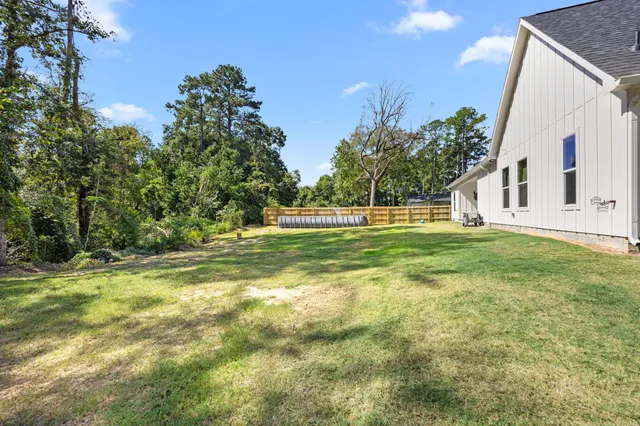 a view of an outdoor space and basketball court