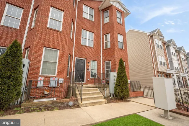 a front view of a multi story residential apartment building