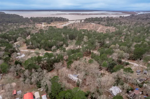 a view of a city with green field