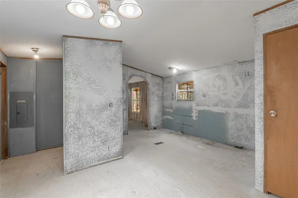 a view of a bathroom with a shower and a toilet